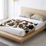 794851d2cea06697124c364124eea405 blanket horizontal lifestyle bedmedium - Cow Print Shop